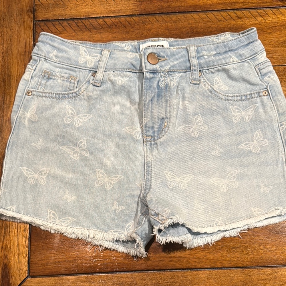 Like new girls RSQ denim shorts with white butterflies. Size 12.